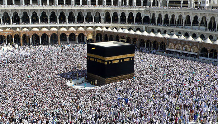 Muslim pilgrims walk around the Kaaba at the Grand Mosque in the Saudi holy city of Mecca on November 30, 2009. — AFP