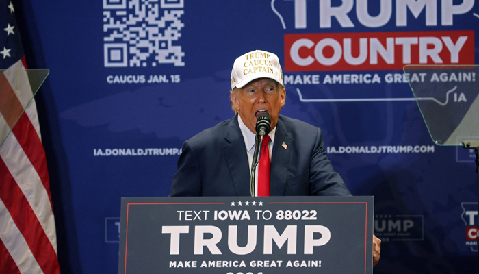 Former President Donald Trump speaks to supporters during a rally at Simpson College on January 14, 2024, in Indianola, Iowa. — AFP