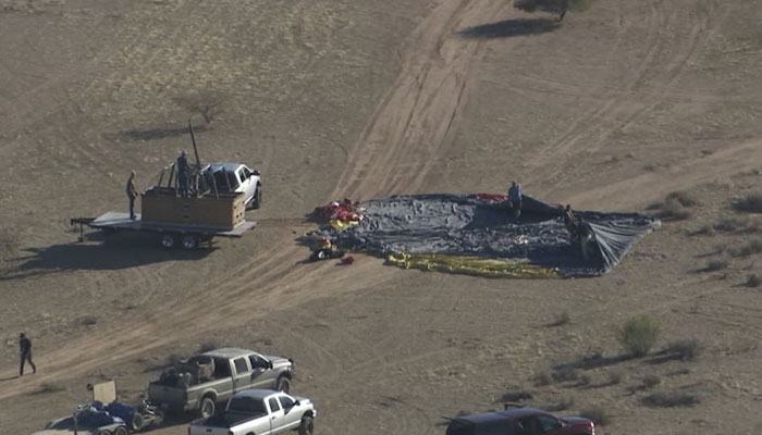 This picture shows an aerial view of the crashed hot air balloon in a desert in Eloy, Arizona on January 14, 2024. — X/@AndyMacNews