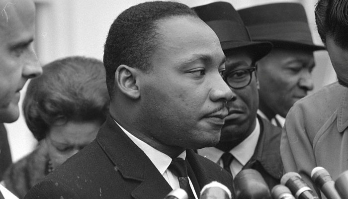 Martin Luther King Jr. speaks after meeting with President Lyndon B. Johnson to discuss civil rights at the White House in Washington, December 3, 1963. —Reuters