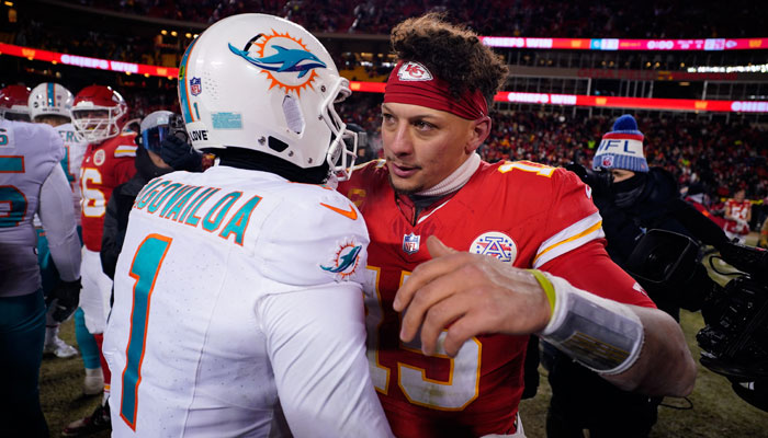 Kansas City Chiefs quarterback Patrick Mahomes (15) meets with Miami Dolphins quarterback Tua Tagovailoa (1) following the 2024 AFC wild card game at GEHA Field at Arrowhead Stadium in Kansas City, Missouri, US, on January 13, 2024. — Reuters