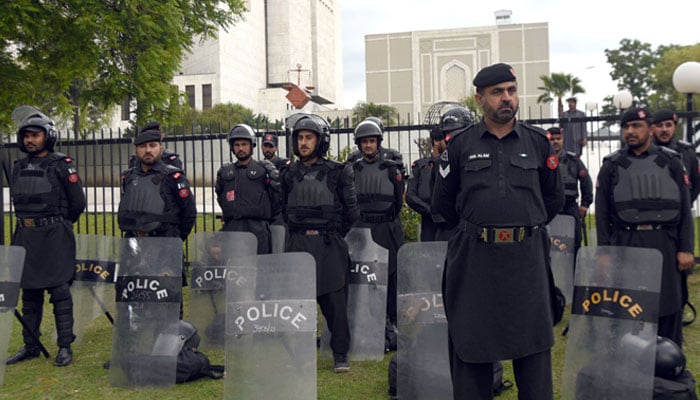 Personnel of Frontier Constabulary stand alert outside Supreme Court in Islamabad on April 3, 2023. — Online