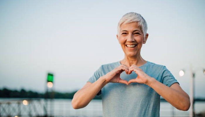 A woman gestures for a photograph. — X/@istock