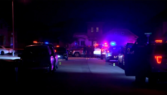 This screengrab shows police vehicles parked outside houses in the neighbourhood in Katy, where the shooting took place on January 21, 2024. — ABC 13