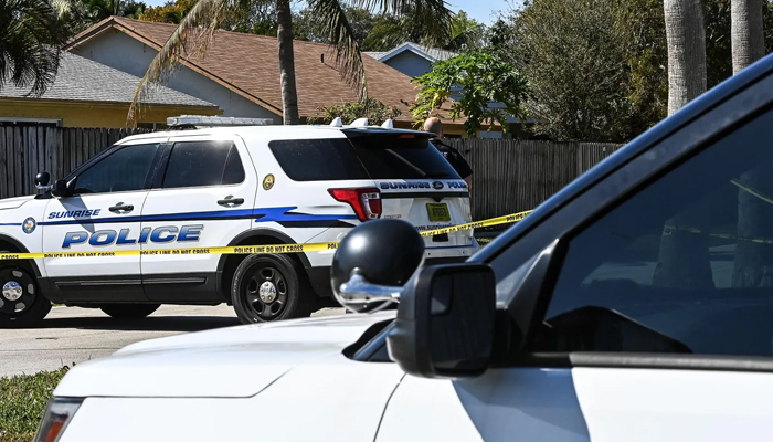 Police vehicles in the US can be seen parked. — AFP/File