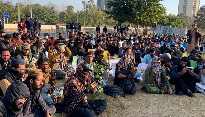 The image shows Baloch protesters in front of the Press Club in Islamabad on Dec 23, 2023. —x/Khushal_Khattak