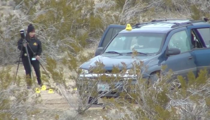 An official of the El Mirage police can be seen investigating the scene in San Bernardino County in this still on January 24, 2024. — NBC Los Angeles