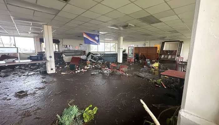 Ths image shows the destruction at Cafe Roi after the flood. — USA Today via US Army