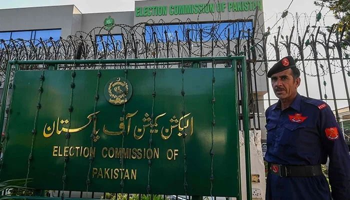 A security personnel stands guard at the headquarters of Election Commission of Pakistan in Islamabad on September 21, 2023. — AFP