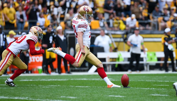 San Francisco 49ers punter Mitchell Wishnowsky kicks the ball during Super Bowl 54 against the Kansas City Chiefs at Hard Rock Stadium in Miami in the teams road white uniform. — AFP/File