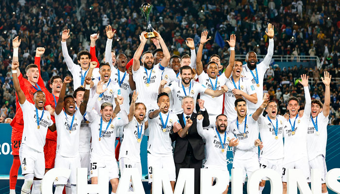Real Madrid poses with the trophy as they clinch their fifth Fifa Club World Cup title after defeating Saudi Arabia’s Al-Hilal in Rabat, Morocco on February 12, 2022. — X/@realmadrid