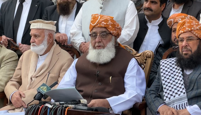 JUI-F supremo Maulana Fazlur Rehman (centre) addresses the press conference in Islamabad on February 14, 2024. — Facebook/MoulanaOfficial