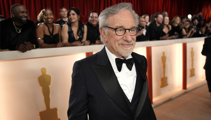 Steven Spielberg appears solo amidst a star-studded event