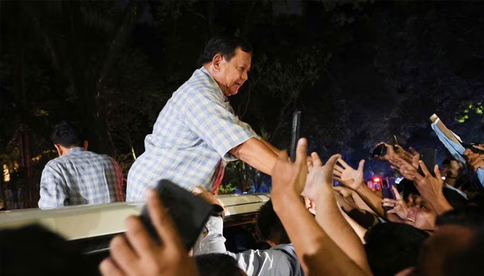 Indonesias Defence Minister and presidential candidate Prabowo Subianto greets his supporters in Jakarta, Indonesia February 14, 2024. —Reuters