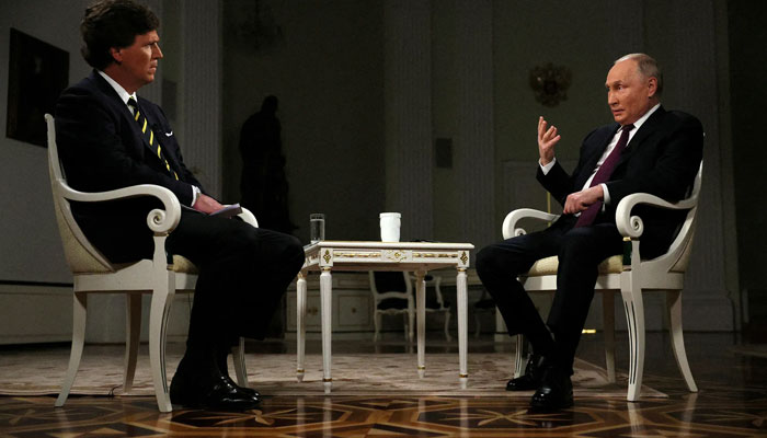 The image released by the Russian state media shows Tucker Carlson interviewing President Vladimir Putin in Moscow. — Reuters