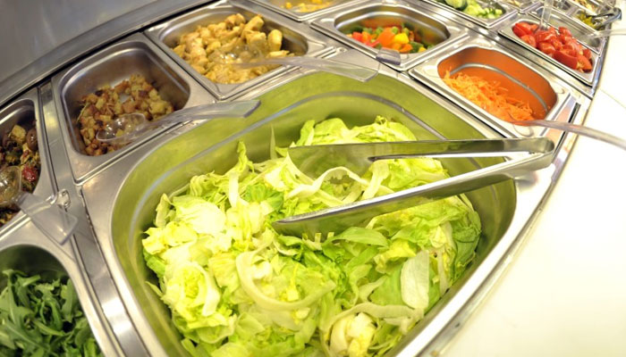 Pre-cut vegetables of a self service salad bar are displayed for sale in a shop in the northern German town of Hamburg May 26, 2011. —Reuters