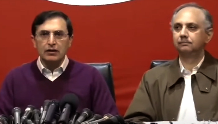 PTI leaders Barrister Gohar Ali Khan (left) and Omar Ayub Khan address the press conference in Islamabad on February 18, 2024, in this still taken from a video. — Geo News