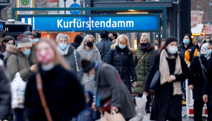 People with protective face masks walk at Kurfurstendamm shopping boulevard, amid the coronavirus disease (COVID-19) outbreak in Berlin, Germany, December 5, 2020. —Reuters