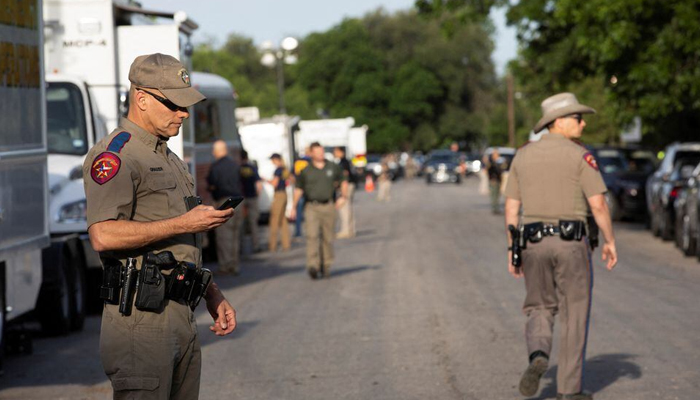 Law enforcement personnel work at the scene of a mass shooting in Robb Elementary School, in Uvalde, Texas, US. — Reuters/File