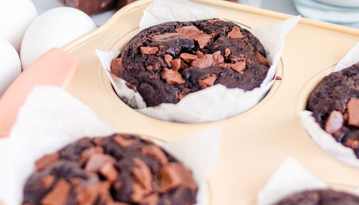 A tray of chocolate muffins. — Unsplash