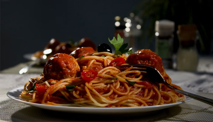 A plate of spaghetti and meatballs. — Unsplash