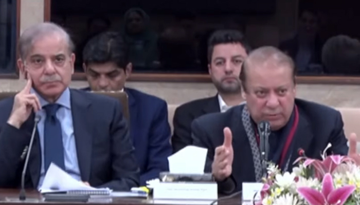 PML-N Nawaz Sharif (right) addressing the media following parliamentary party meeting in this still taken from a video on February 28, 2024. — YouTube/GeoNews