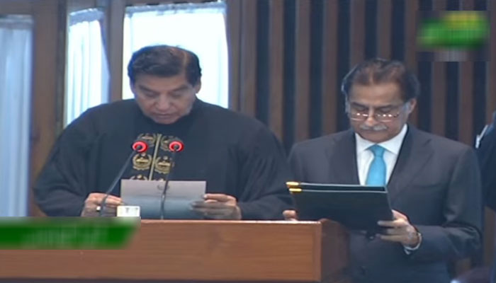 Outgoing Speaker Raja Parvez Ashraf administers the oath to Ayaz Sadiq on March 1, 2024. — Screengrab