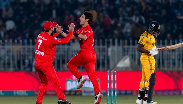 Islamabad Uniteds players celebrating after taking a wicket of  Peshawar Zalmi on March 4, 2024. — PCB