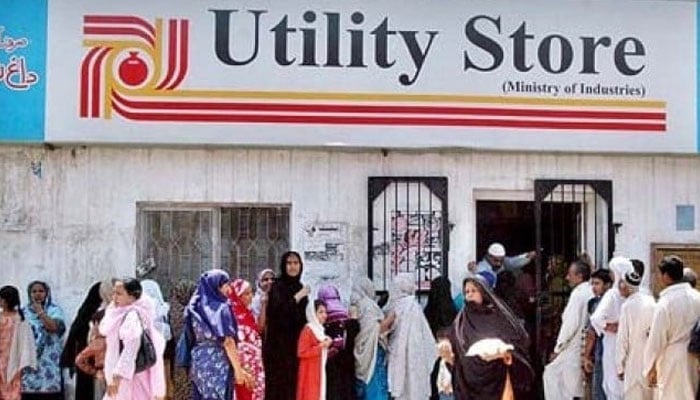 People are standing in queues to buy their groceries from a store of the Utility Stores Corporation. — Radio Pakistan