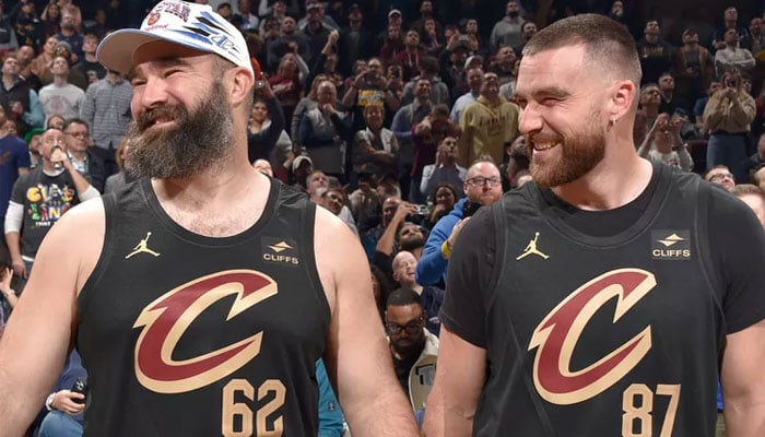 Kansas City Chiefs tight end Travis Kelce (right) and former NFL legend Jason Kelce attend Cleveland Cavaliers game against Boston Celtics at Rocket Mortgage FieldHouse, in Cleveland, Ohio, US on March 5, 2024. — AFP