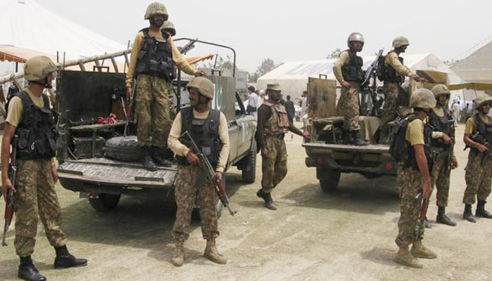 Pakistani soldiers stand guard in Bannu, Khyber-Pakhtunkhwa July 2, 2014. — Reuters