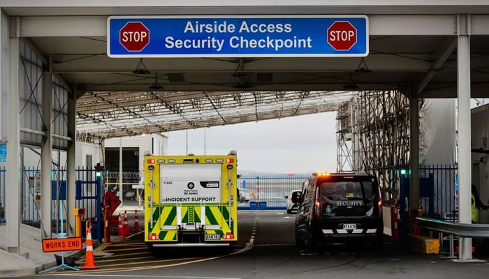 An ambulance at Auckland International Airport after passengers were injured during a Latam flight from Sydney to Auckland on March 11, 2024. – NZ Herald via Dean Purcell