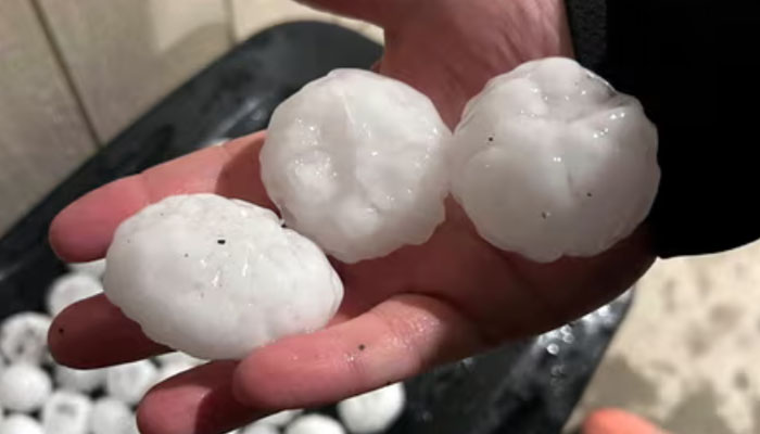 This image shows massive hail that fell on Kansas on March 13, 2024. — X/@eagle_feed
