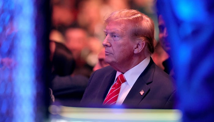 Former president Donald Trump watches Song Yadong fight Peter Yan during UFC 299 at Kayesa Center on March 9, 2024. — Reuters