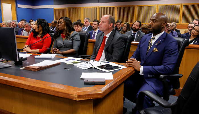 (L-R) Fulton County District Attorney Fani Willis, Prosecutor Daysha Young and Attorney Andrew Evans, Prosecutor Nathan Wade attend a hearing on the Georgia election interference case, March 1, 2024, in Atlanta, Georgia.  – Reuters