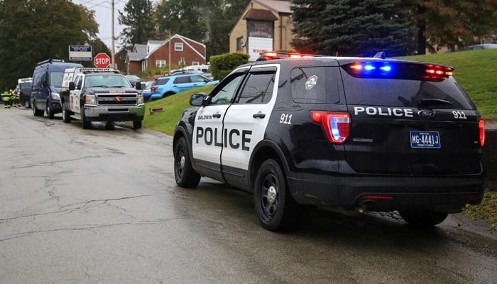 Police vehicles are deployed near the vicinity of the home of the Pittsburgh synagogue shooting in Baldwin borough, a suburb of Pittsburgh, Pennsylvania. — Reuters/File