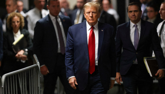 Former president Donald Trump walks outside the courtroom on the day of a court hearing in New York State Supreme Court in the Manhattan borough of New York City on February 15, 2024. — Reuters