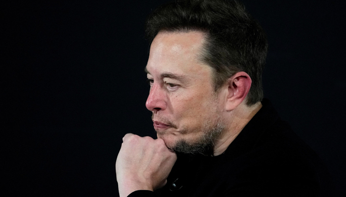 Tesla and SpaceXs CEO Elon Musk pauses during an in-conversation event with British Prime Minister Rishi Sunak in London, Britain, November 2, 2023. — Reuters