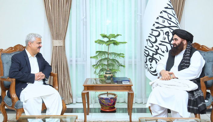 Commerce Secretary Khurram Agha (left) in talks with Afghanistans Foreign Minister Amir Khan Muttaqi, — X/@Pak_AfgAffairs