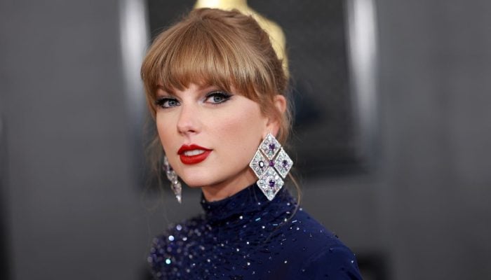 Taylor Swifts makeup artist shares backstory behind her classic red lip