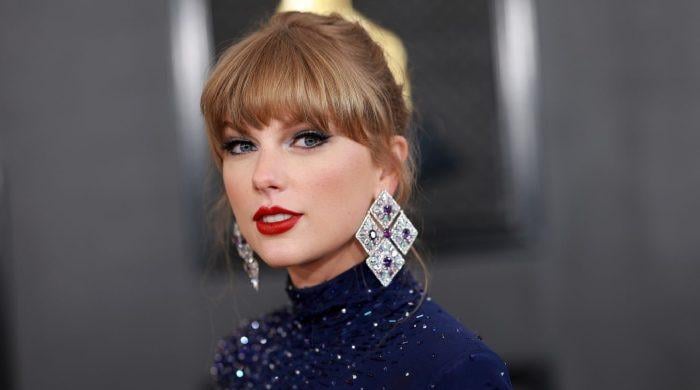 Taylor Swift’s makeup artist shares backstory behind her classic red lip