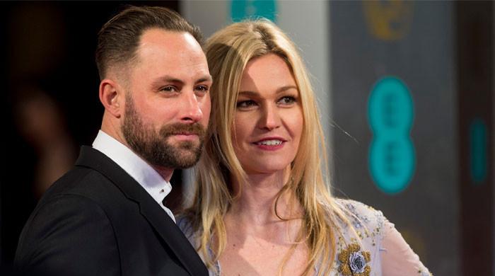 Julia Stiles reveals secret arrival of third baby with husband Preston Cook