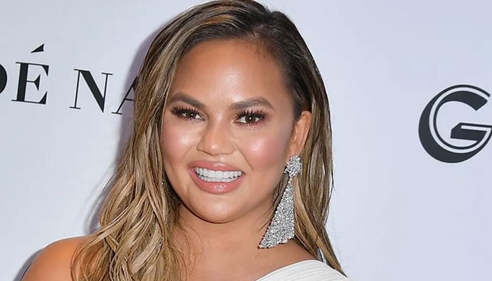 Chrissy Teigen shows off her traditional attire