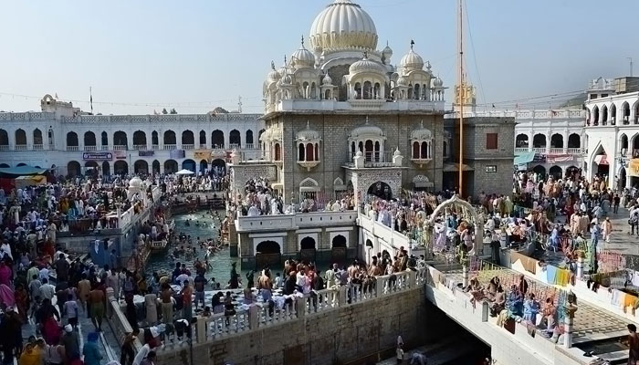 Sikh pilgrims gather at the Gurdwara Panja Sahib during the Baisakhi festival in Hasan Abdal. — AFP/File