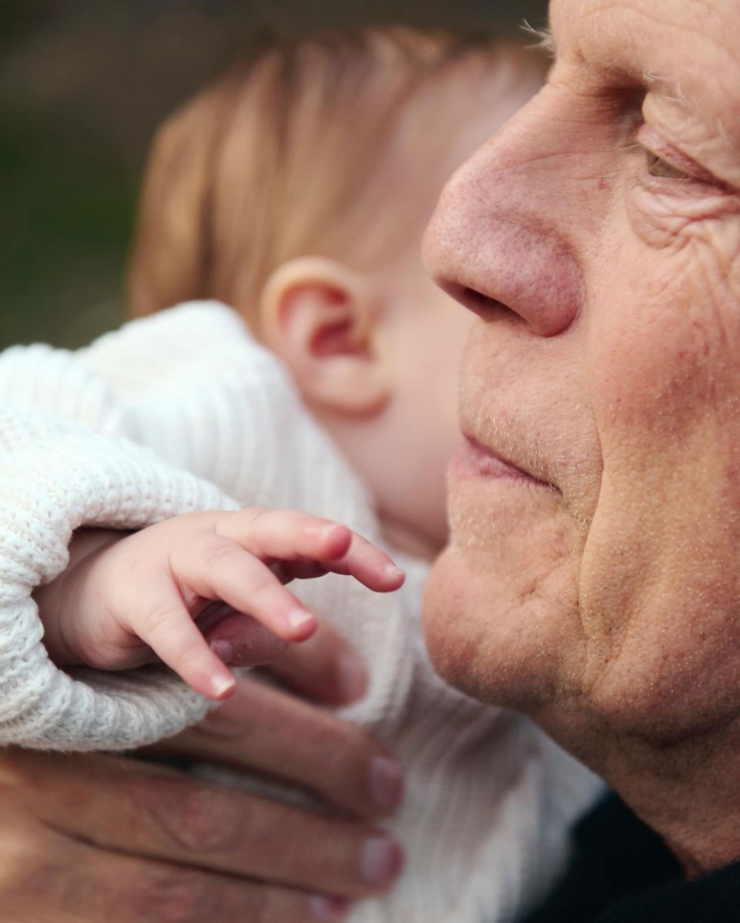 Bruce Willis holds his granddaughter in a stunning shot amidst dementia