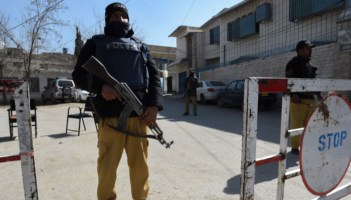 Policemen stand guard outside the provincial Election Commission office ahead of the upcoming general elections, in Quetta on February 5, 2024. — AFP