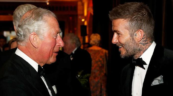 King Charles meets with David Beckham after telling Prince Harry he’s busy