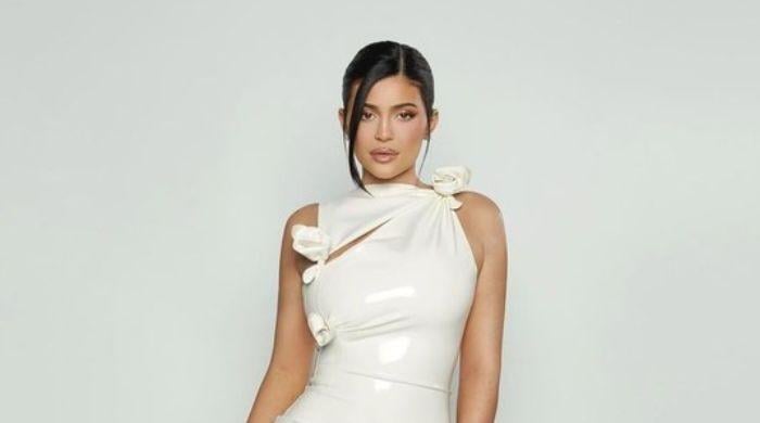 Kylie Jenner radiates confidence in bts for 'The Kardashians' cover shoot