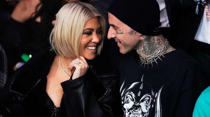 Kourtney Kardashian, Travis Barker take baby Rocky for stroller ride