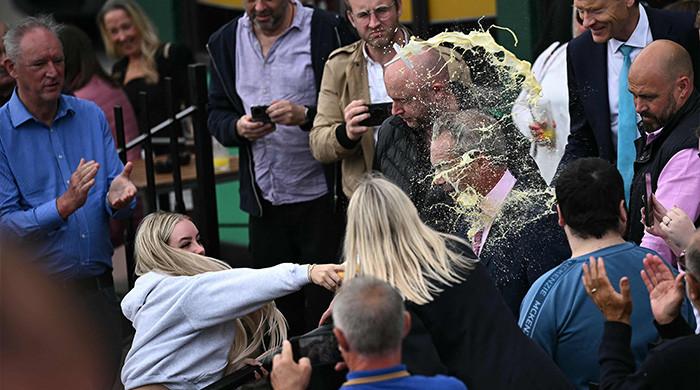 UK’s Reform Party leader hit by milkshake from mystery woman during Clacton campaign M Haris